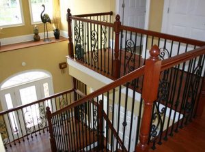 Turned Newels with Iron Balusters