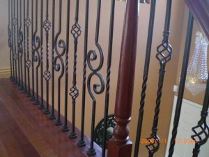 Iron Balusters, Turned Newels, & Bending Handrail