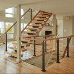 FLIGHT monostringer black posts and wood handrail