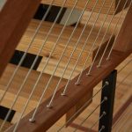 Wood angle tension into top of handrail close up