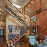 thick tread floating staircase in powder coat silver