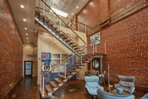 thick tread floating staircase in powder coat silver